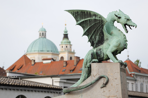 Dragon statue in Ljubljana, Slovenia. Dragon is the symbol of the city. Statue is part of a bridge built in 1901.