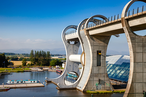 Falkirk Wheel, a rotating boat lift connecting the Forth and Clyde Canal with the Union Canal near Falkirk, Scotland, UK