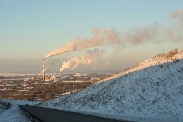 Power plant with smoke and dirty orange air