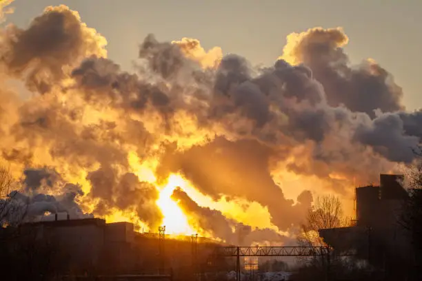 Power plant with smoke and dirty orange air