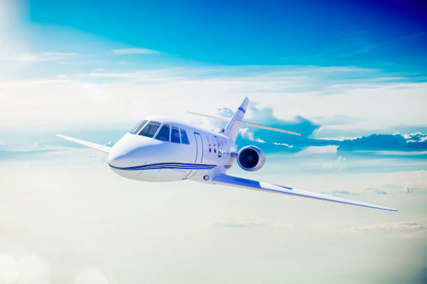 Single engine ultralight plane flying in the blue sky with white clouds