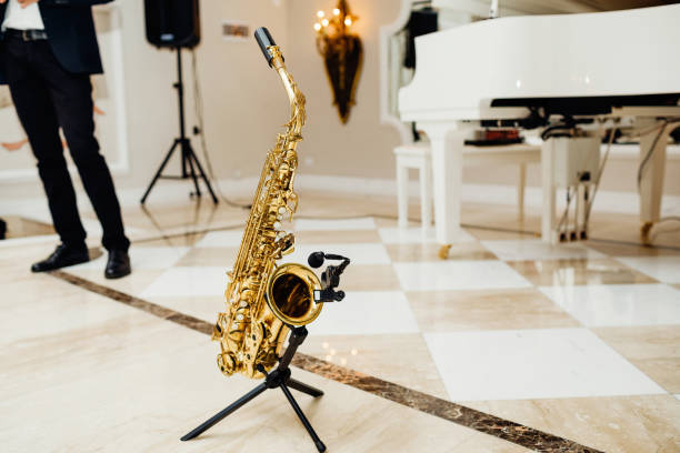 istock Saxophone on the stage close up 953828948