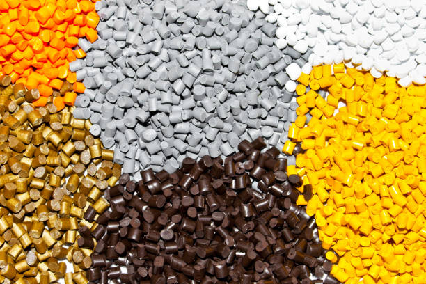Plastic pellets. Polymeric dye.  Colorant for plastics in the granules. Plastic color resin closeup Plastic pellets. Polymeric dye.  Colorant for plastics in the granules. Plastic color resin closeup polypropylene stock pictures, royalty-free photos & images