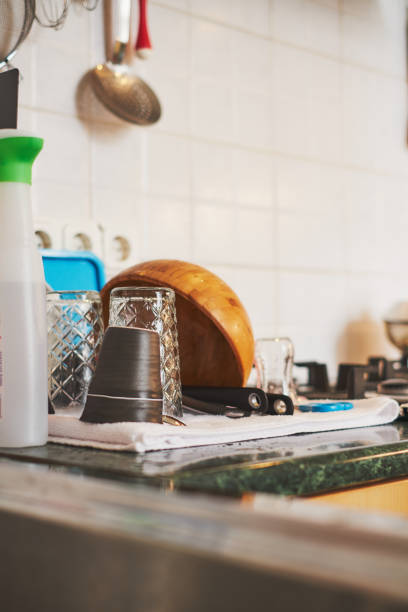 istock Untidy home details, drying dishes near sink 953831030