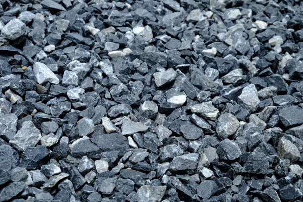 istock Small grey and blue rock in dark tone 953834336