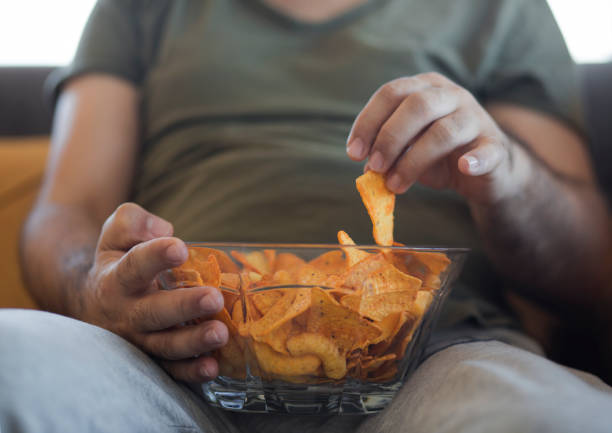 istock Eating some snack during the watching TV 953835454