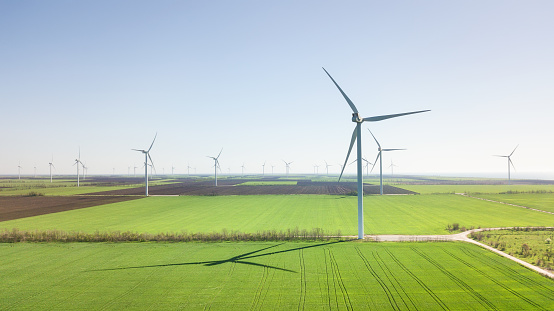 Wind power station on the field. Concept and idea of alternative energy development