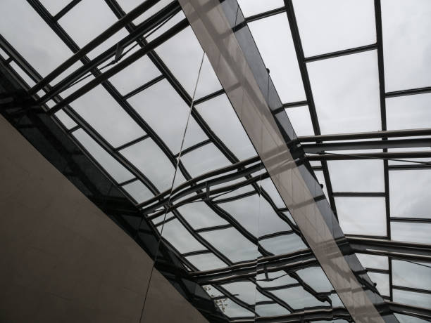 istock The glass architecture in city against a sky 953839022