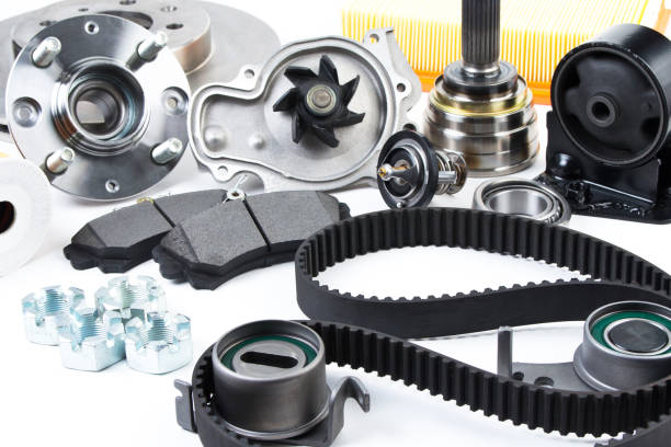 istock Auto parts background. Hub, pump, brake pads, filter, timing belt, rollers, constant velocity joints, thermostat and other on white background. 953840508