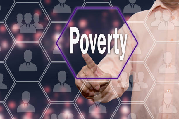 istock Poverty. An elderly person presses the Poverty button on the touch screen. The concept of poverty awareness. Bankruptcy. 953840586