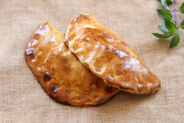 istock Meat Pastie Homemade with extra herbs and peppers 953843300