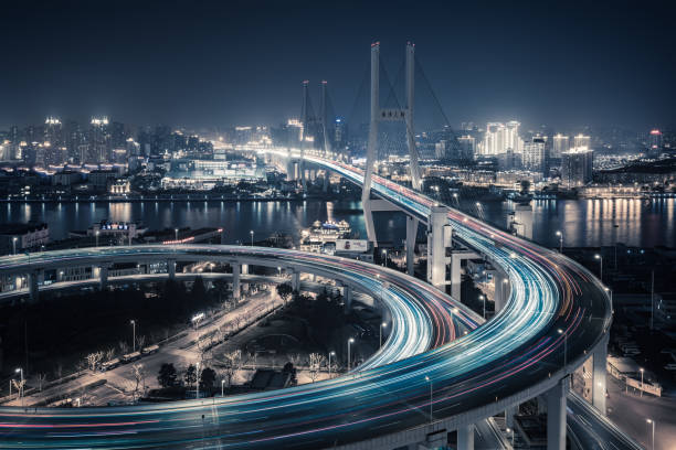 istock Bridge traffic at night in ShangHai China 953844924