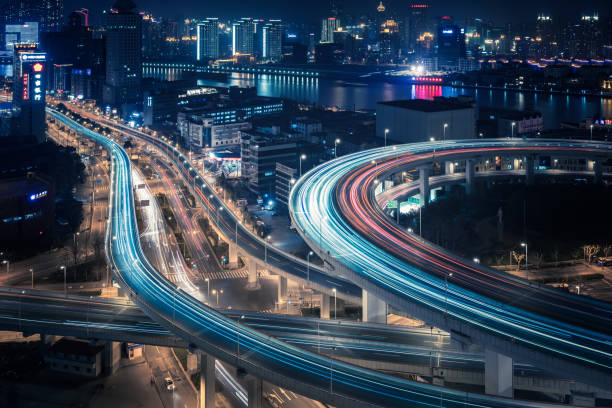 istock Bridge traffic at night in ShangHai China 953845110