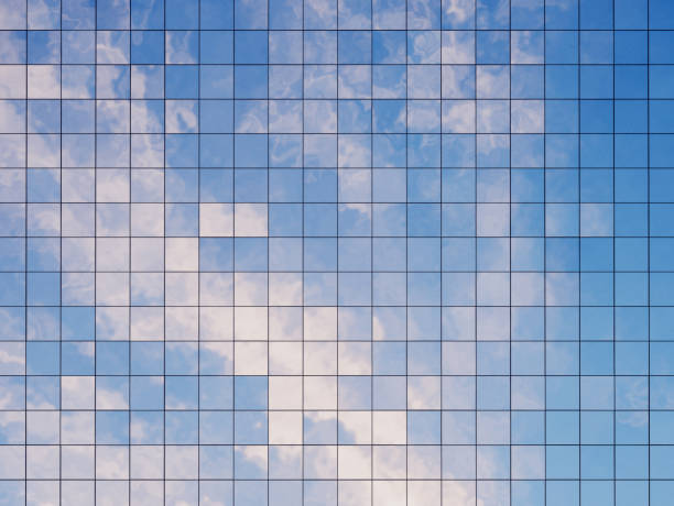 istock View of the clouds reflected in the glass office building. 3d rendering 953848456