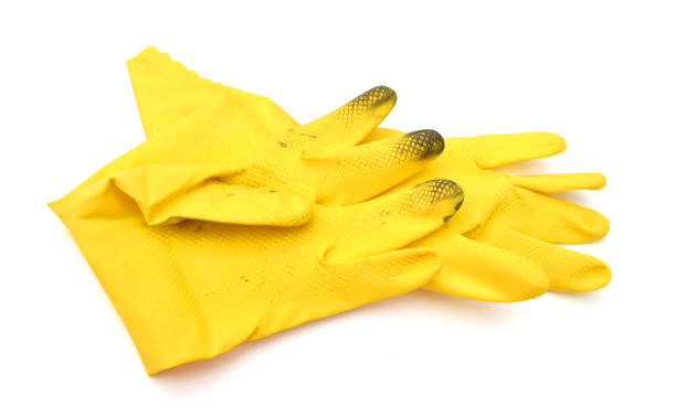 istock Yellow rubber gloves isolated on white 953848952