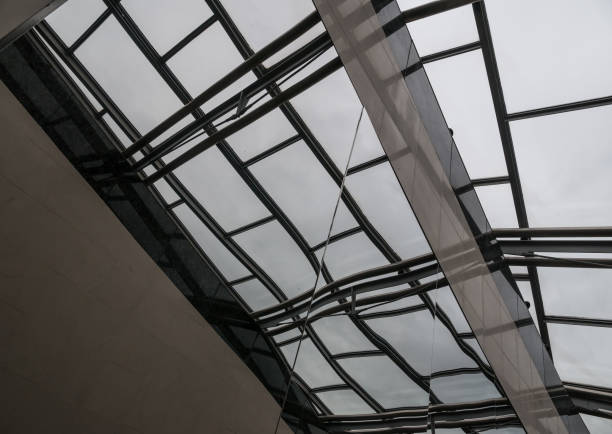 istock The glass architecture in city against a sky 953852620