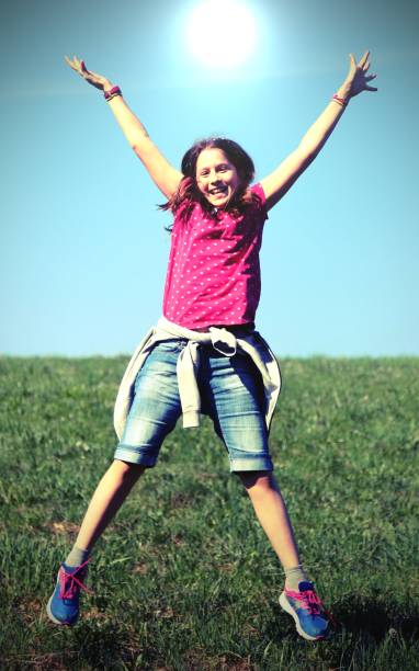 istock happy little girl with vintage effect 953852986