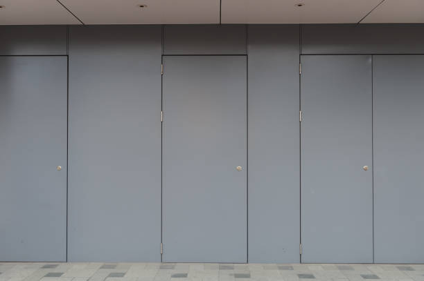 istock sidewalk by street wall & door 953853892