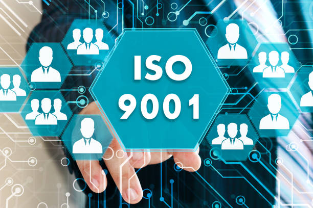 istock The businessman clicks the  button ISO 9001 on the touch screen 953855670