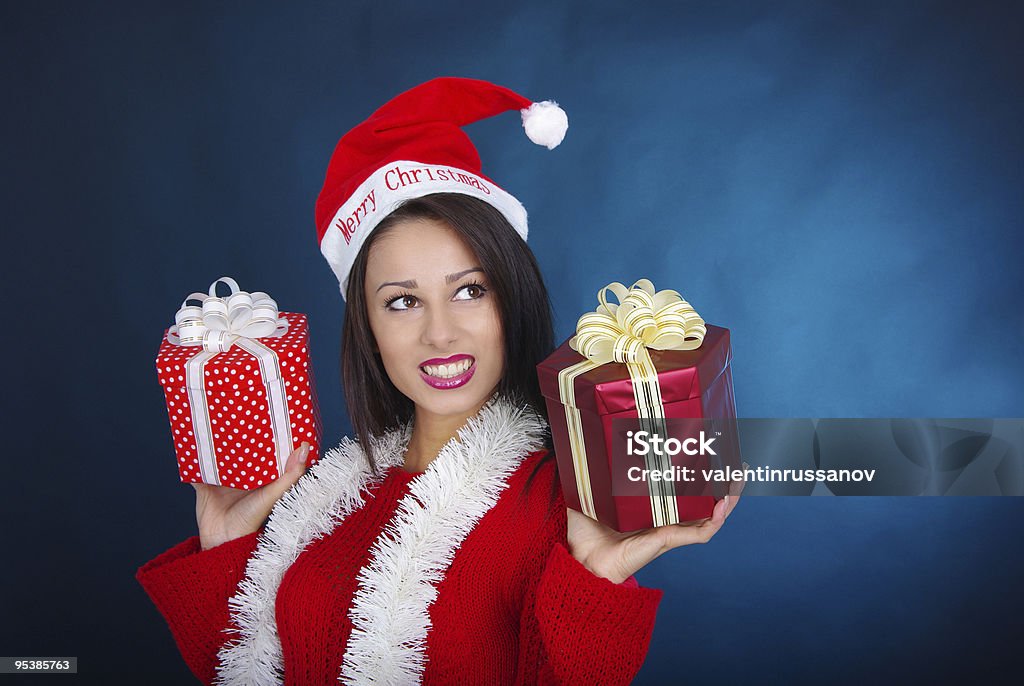 Giovane donna in abito di Natale - Foto stock royalty-free di 25-29 anni