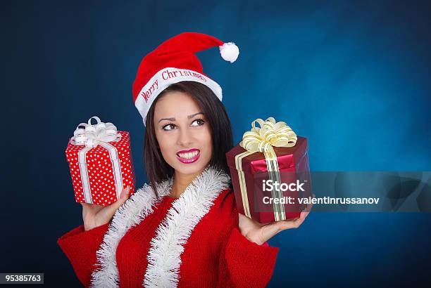 Foto de Jovem Mulher No Vestido De Natal e mais fotos de stock de 25-30 Anos - 25-30 Anos, Adulto, Alegria