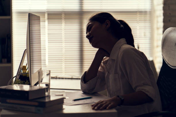 istock Asian women Aches from working She felt like relaxing 953858184