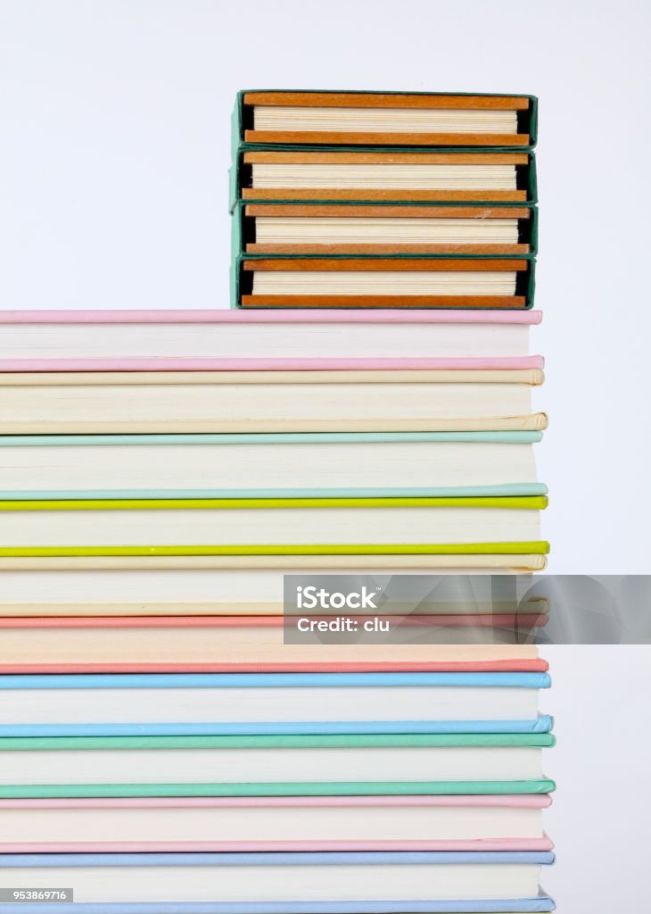 Multi Books Stacker Stack Of Multi Colored Books On White Stock Photo - Download Image Now ...