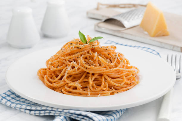 istock pasta with tomato sauce on a plate 953870438