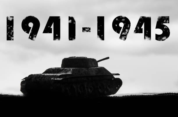 Silhouette of a tank against a background of dark clouds sky. The Second World War. 1941-1945. 9-th of May. Great Victory Day Silhouette of a tank against a background of dark clouds sky. The Second World War. 1941-1945. 9-th of May. Great Victory Day 1945 stock pictures, royalty-free photos & images