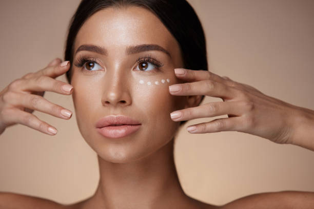 istock Woman With Smooth Soft Skin And Concealer Under Eyes. Cosmetics 953875888