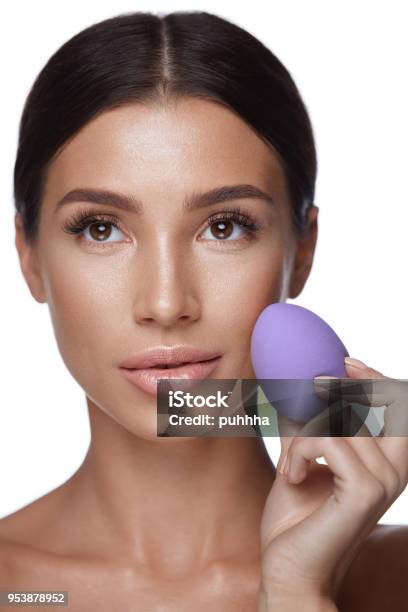 Beauty Makeup Beautiful Woman Applying Foundation With Sponge Stock Photo - Download Image Now