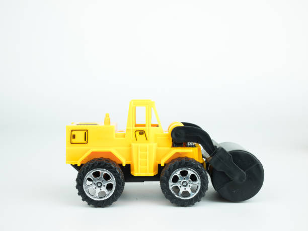 istock Toy Pressure road car on white background, Engineering construction concept 953884440