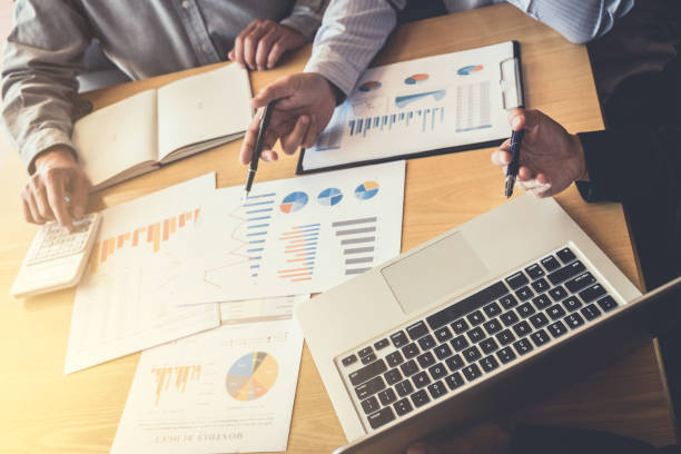 istock Meeting and greeting, Business team colleagues discussing working analysis with financial data and marketing growth report graph in team, Meeting Talking Brainstorming Communication Concept 953887204