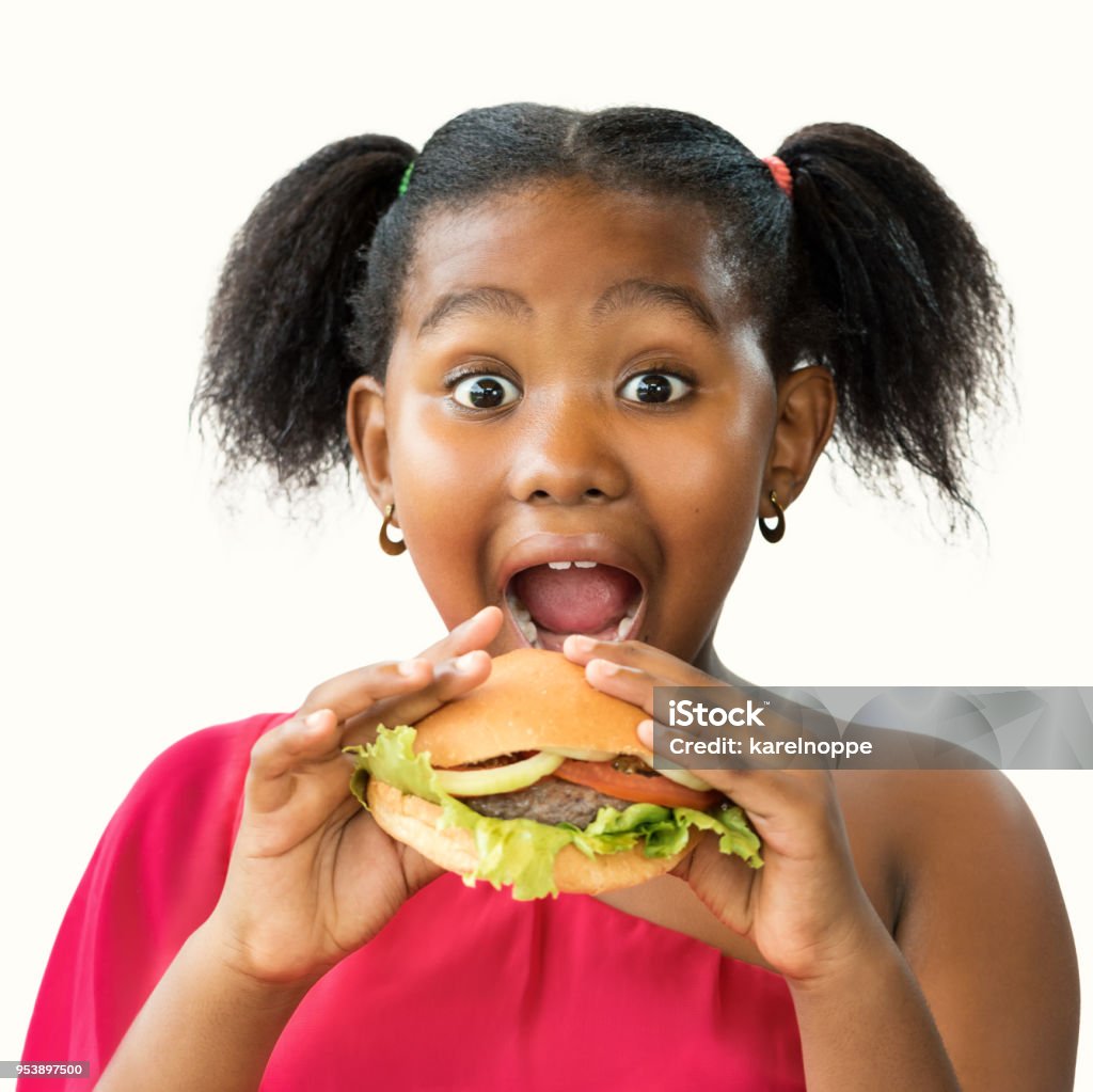 little girl eating meat