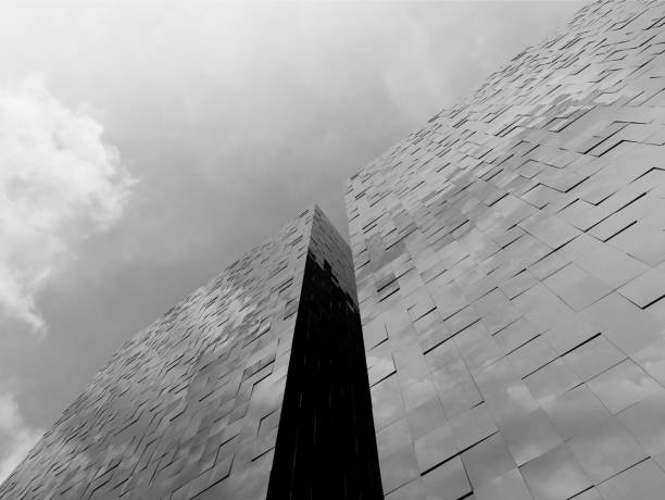 istock View of the clouds reflected in the glass office building. 3d rendering 953897746