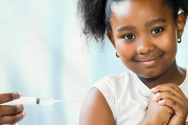 istock Brave little african girl at doctor's practice. 953897922