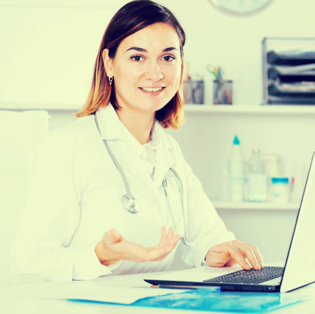 istock Female doctor offering help 953902434