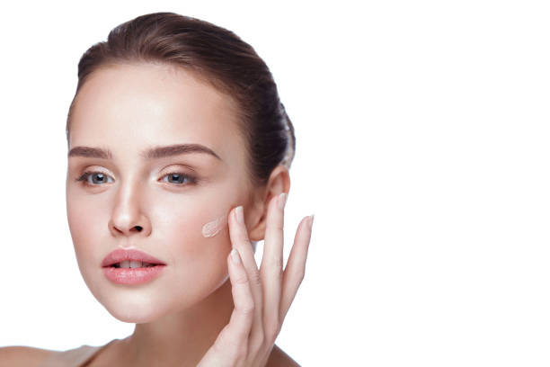 istock Beautiful Female Model With Makeup And Cream Foundation. Beauty 953910978