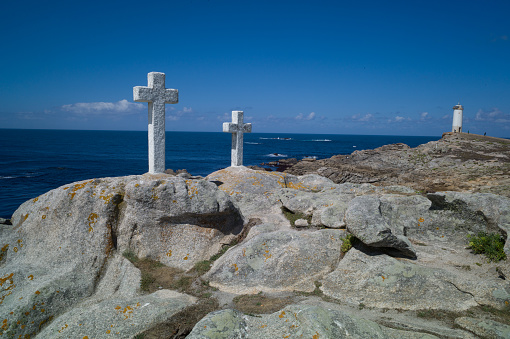 Death Coast with lighthouse and cross of dead fishermen in Galicia