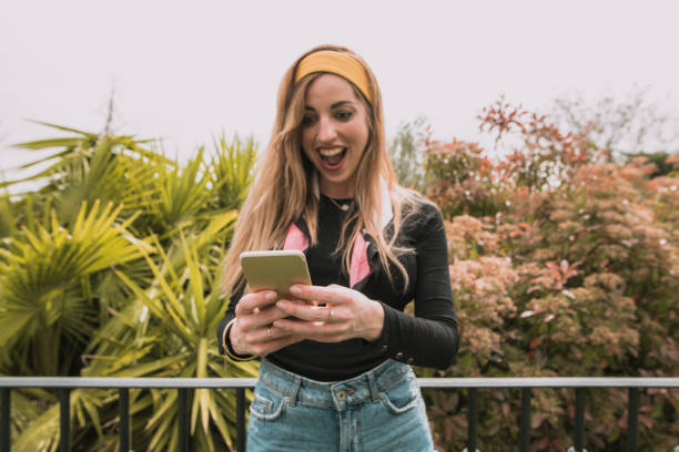istock Woman texting with her smartphone 953929274