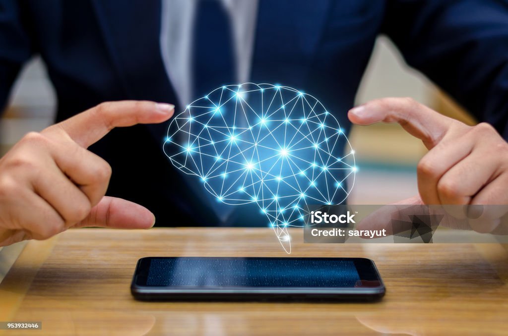 Hand Business people press the phone. Brain Graphic Binary Blue Technology Artificial Intelligence Stock Photo