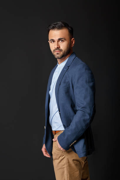 istock handsome elegant sexy man in suit 953936718