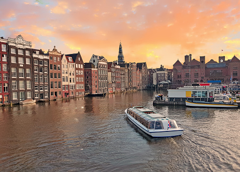 City scenic from the city Amsterdam in the Netherlands at sunset