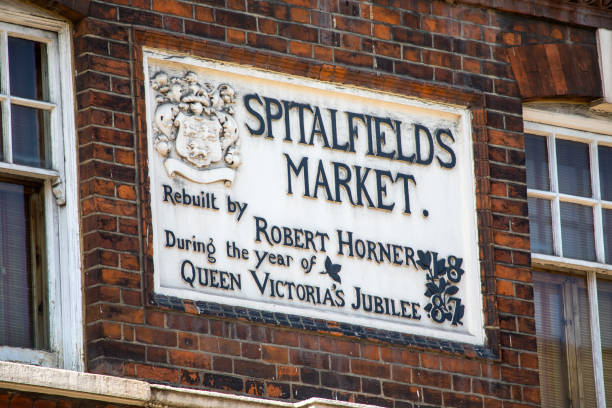 London, UK  - April 19TH 2018: A plaque above the entrance to the historic Spitalfields Market in London, UK, on 19th April 2018.