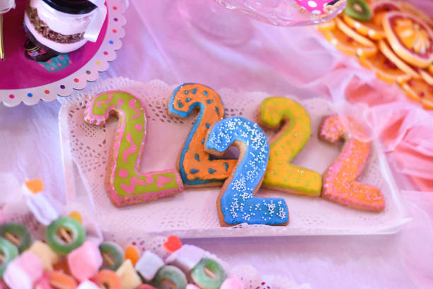 istock Sweet table and delicious cakes for second birthday 953955016