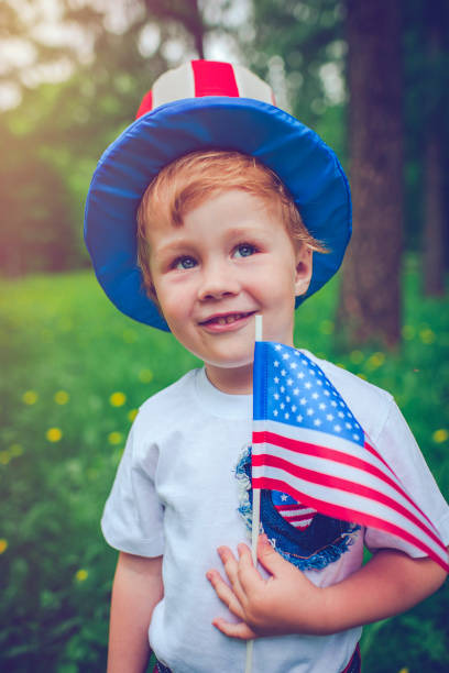 istock Little boy celebrating Fourth of July 953956400