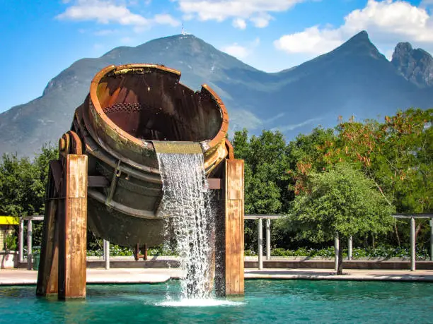 Photo of Metal Melting Furnace Fountain, at Parque Fundidora, Monterrey, Mexico, with Bright Colors