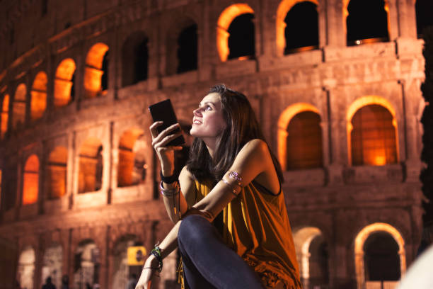istock Smiling girl with phone 953963268