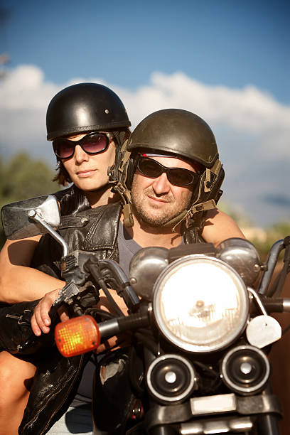 istock Man and Woman on Motorcycle 95396609