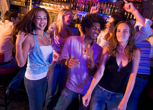 istock Young men and women dancing 95396705